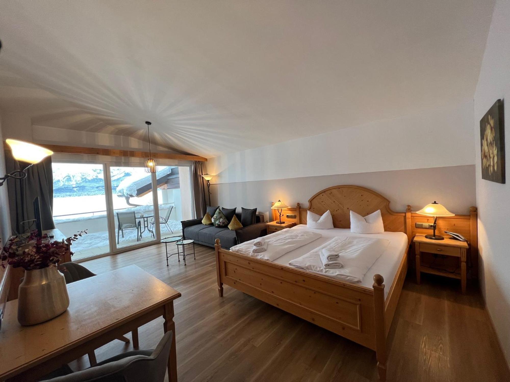 Hotel Fischer Am See ฟุสเซ่น ภายนอก รูปภาพ